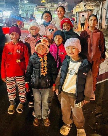 Orphanage Kids in Nagarjun Provided with Shoes, Sporting Goods, Stationaries